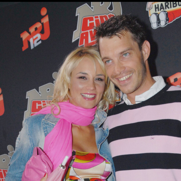 En 2007, ils agrandissaient la famille avec les jumeaux Rose et Jules.
Elodie Gossuin (enceinte) et son mari Bertrand Lacherie - Cérémonie des NRJ Ciné Awards au Grand Rex à Paris le 1er octobre 2007. 