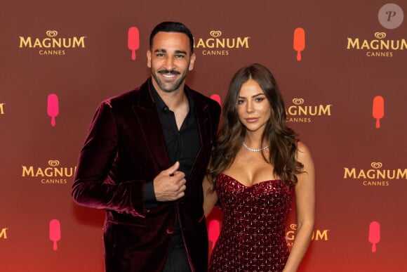 Adil Rami et sa compagne Léna Guillou - Soirée sur la plage Magnum lors du 76ème Festival International du Film de Cannes le 22 mai 2023. © Cannes Magnum/Jeremy Melloul/Bestimage