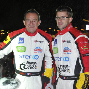 Presentation de la nouvelle voiture de Jean-Pierre et Olivier Pernaut pour le trophee Andros sur le pont de l'Alma a Paris le 4 Decembre 2012.