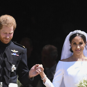 Le prince Harry, duc de Sussex, et Meghan Markle, duchesse de Sussex, à la sortie de chapelle St. George au château de Windsor - Sortie après la cérémonie de mariage du prince Harry et de Meghan Markle en la chapelle Saint-George au château de Windsor, Royaume Uni, le 19 mai 2018. 