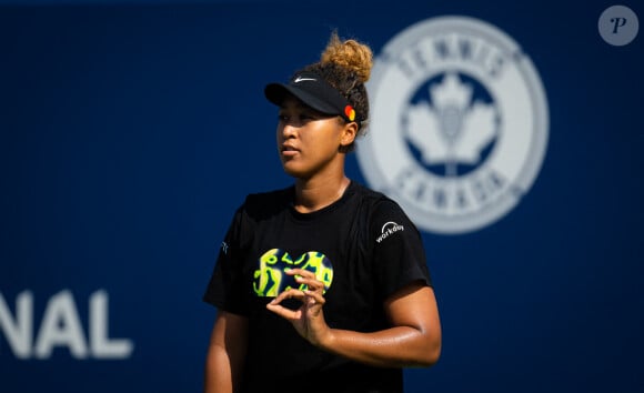 La championne japonaise de tennis Naomi Osaka s'entraîne avec son père Léonard François en marge de l'Open de Toronto (Canada, 6-14 août 2022). Le 7 août 2022. 