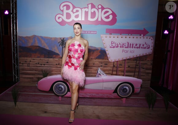 Elle a choisi une robe rose à bustier, dont le haut était rempli de magnifiques gros coeurs, et le bas, à frou-frou.
Exclusif - Enjoy Phoenix (Marie Lopez) - Avant-première du film "Barbie" au Grand Rex à Paris le 18 juillet 2023. © Denis Guignebourg/Bestimage 