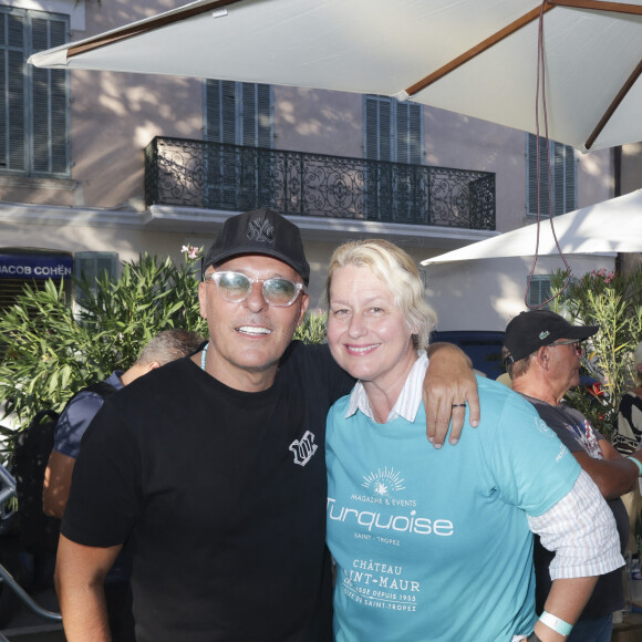 Jean-Roch Pedri, Luana Belmondo lors d'un tournoi de pétanque caritatif organisé par Turquoise magazine au profit de l'association "Sourire à la vie" (association qui soutient les enfants atteints du cancer ) place des Lices à Saint-Tropez le 13 août 2023. © Jack Tribeca / Bestimage 