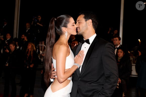 Iris Mittenaere et son fiancé Diego El Glaoui - Montée des marches du film " Le retour (Homecoming) " lors du 76ème Festival International du Film de Cannes, au Palais des Festivals à Cannes. Le 17 mai 2023 © Jacovides-Moreau / Bestimage