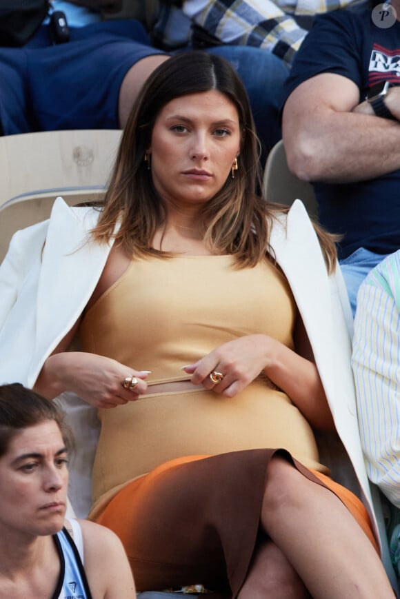 Camille Cerf (Miss France 2015), enceinte dans les tribunes lors des Internationaux de France de Tennis de Roland Garros 2023. Paris, le 7 juin 2023. © Jacovides-Moreau / Bestimage 