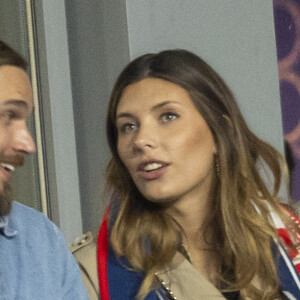 Camille Cerf (Miss France 2015) et son compagnon Théo Fleury - People dans les tribunes lors du match de la 5ème et avant-dernière journée de Ligue des nations entre la France et l'Autriche (2-0) au Stade de France à Saint-Denis le 22 septembre 2022.