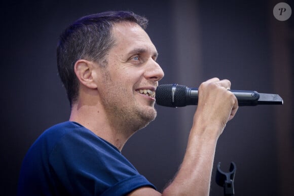 Le musicien a remporté une première victoire contre Fabien Lecoeuvre mercredi 30 août 2023
Le chanteur Fabien Marsaud dit Grand Corps Malade sur la scène du festival du Printemps de Pirogues à la Plaine de l'Ain à Saint-Vulbas (01), France le 01/07/2022. © Sandrine Thesillat / Panoramic / Bestimage