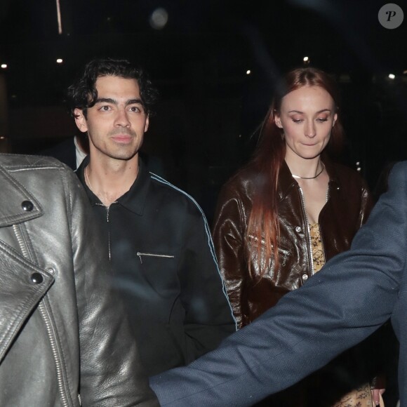 Joe Jonas et sa femme Sophie Turner à la sortie d'un concert after party à Londres, Royaume Uni, le 14 avril 2023. 