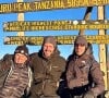 Paul Belmondo pose au sommet du Kilimandjaro avec l'un de ses amis, ainsi que son fils, l'acteur Victor Belmondo.