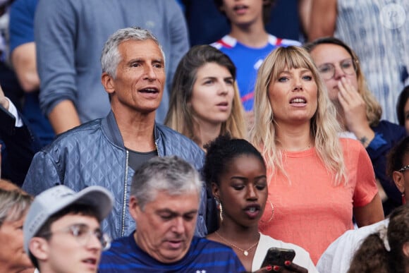 Nagui et sa femme Melanie Page - Célébrités dans les tribunes du match de football entre la France et la Grèce au Stade de France dans le cadre des éliminatoires pour l'Euro 2024, le 19 juin 2023. © Cyril Moreau/Bestimage