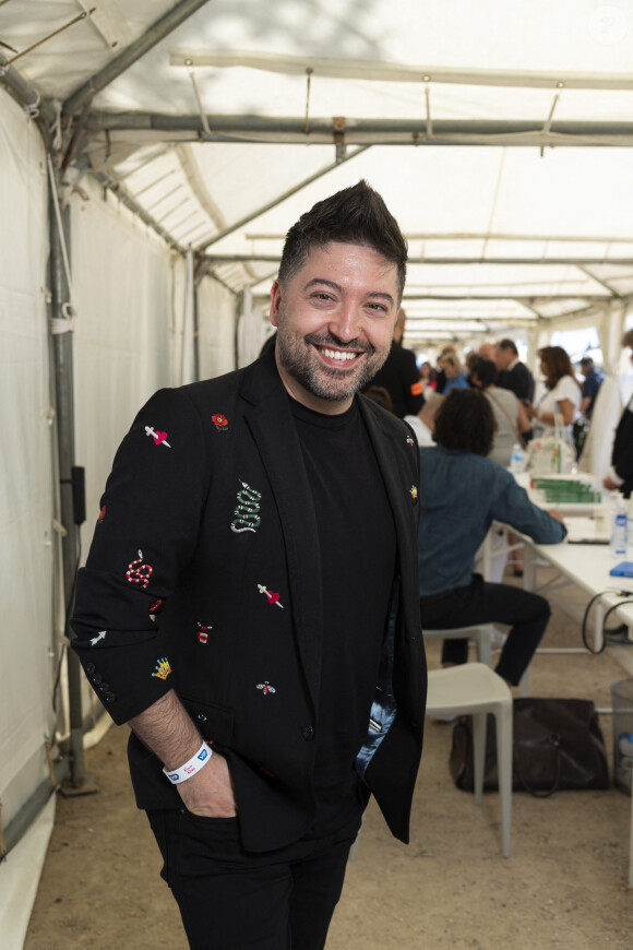 Exclusif - Chris Marques - Festival des Livres et des Artistes organisé par l'association "Lecture pour Tous" engagée dans la lutte contre l'illettrisme au Mail Branly à Paris le 2 juillet 2022. © Pierre Perusseau / Jack Tribeca / Bestimage 