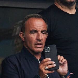 Nikos Aliagas - Célébrités dans les tribunes du match de football entre la France et la Grèce au Stade de France dans le cadre des éliminatoires pour l'Euro 2024, le 19 juin 2023. © Cyril Moreau/Bestimage