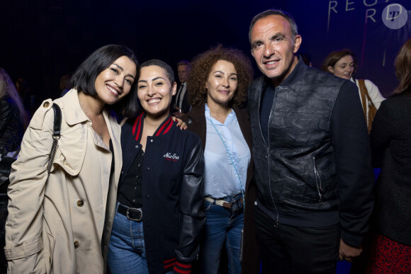 Il s'est montré plus sérieux pour parler de son "admiration" pour Karima.
Exclusif - Karima Charni et ses soeurs, Nikos Aliagas - Vernissage de l'exposition photographique de Nikos Aliagas "Regards Miroirs" à la Seine Musicale à Boulogne-Billancourt le 14 avril 2022. © Cyril Moreau/Bestimage 