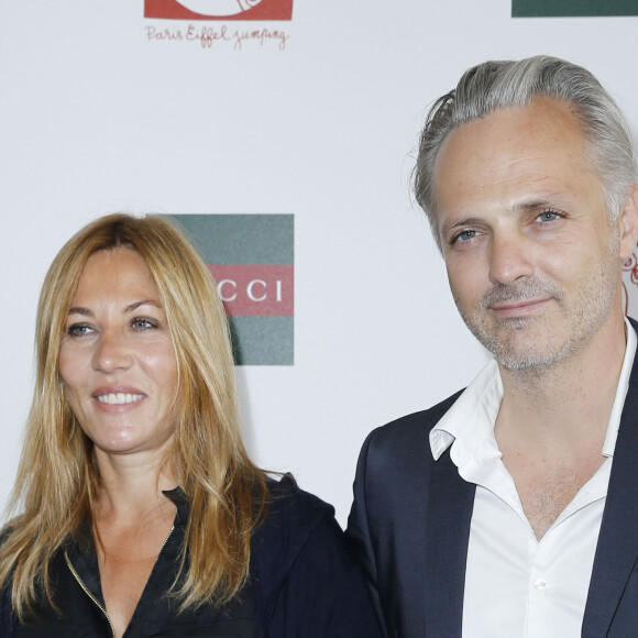 Exclusif - Mathilde Seigner et son compagnon Mathieu Petit - Jour 3 - Longines Global champions tour Paris Eiffel Jumping présenté par Gucci, au Champ de Mars à Paris le 6 juillet 2014. 