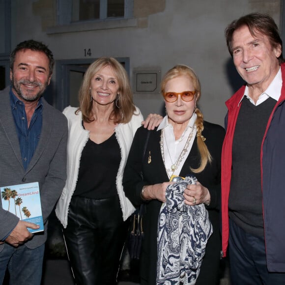 Bernard Montiel, Martine Couralet-Laing, Sylvie Vartan et son mari Tony Scotti - Martine Couralet-Laing dédicace son livre "DreamLAnd" à la Galerie XII à Paris le 19 Octobre 2023. © Bertrand Rindoff / Bestimage 