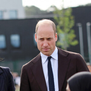 Le prince William, prince de Galles, et Catherine (Kate) Middleton, princesse de Galles, lors d'une visite au lycée Fitzalan de Cardiff, le 3 octobre 2023. Le couple princier est venu pour en apprendre davantage sur les cours professionnels proposés par l'école. 