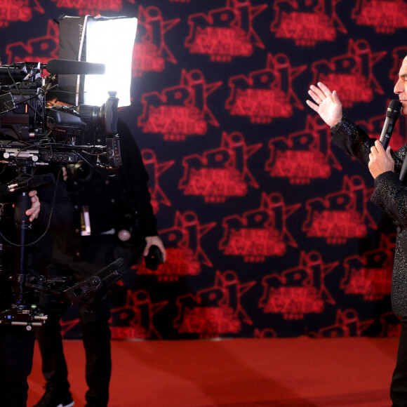 En effet, la cérémonie sera enregistrée au lieu d'être en direct pour des raisons de sécurité.
Nikos Aliagas lors de la 23ème édition des NRJ Music Awards 2021 au Palais des Festivals de Cannes, le 20 novembre 2021. © Dominique Jacovides/Bestimage 