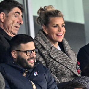 Charles Ange Ginésy, le président du Conseil Départemental des Alpes-Maritimes, et Laura Tenoudji Estrosi durant le match de football de phase de groupes de l'Euro 2024, France contre Gibraltar, à l'Allianz Riviera à Nice, le 18 novembre 2023. Déjà qualifiée pour l'Euro-2024, la France a battu Gibraltar 14 à 0. C'est la plus large victoire de l'histoire des Bleus. Ils se sont imposés grâce notamment à un triplé de Kylian Mbappé et des doublés de Kingsley Coman et Olivier Giroud. Warren Zaïre-Emery, qui a fait ses grands débuts en Bleu à 17 ans, 8 mois et 10 jours, le plus jeune joueur à revêtir le maillot bleu depuis 1911, a été l'auteur du 3eme but. Le milieu de terrain n'a profité qu'un quart d'heure de sa première sélection en équipe de France, à 17 ans, ayant été contraint de sortir prématurément, blessé à la cheville juste après avoir marqué son premier but avec les Bleus. © Bruno Bebert / Bestimage 