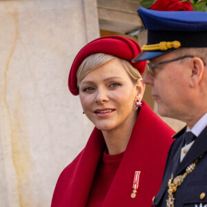 La princesse Gabriella, la princesse Charlene et le prince Albert II de Monaco - La famille princière monégasque dans la cour d'honneur du palais lors de la la fête nationale à Monaco, le 19 novembre 2023. La famille princière monégasque assiste à la prise d'armes, puis à la cérémonie de remise des médailles et à un défilé militaire sur la place du palais princier. © Olivier Huitel / Pool Monaco / Bestimage 