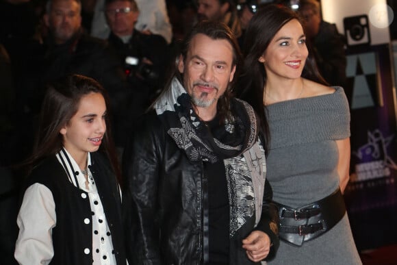 Florent Pagny, sa femme Azucena et leur fille Ael lors de la 15e cérémonie des NRJ Music Awards à Cannes le 14 décembre 2013.