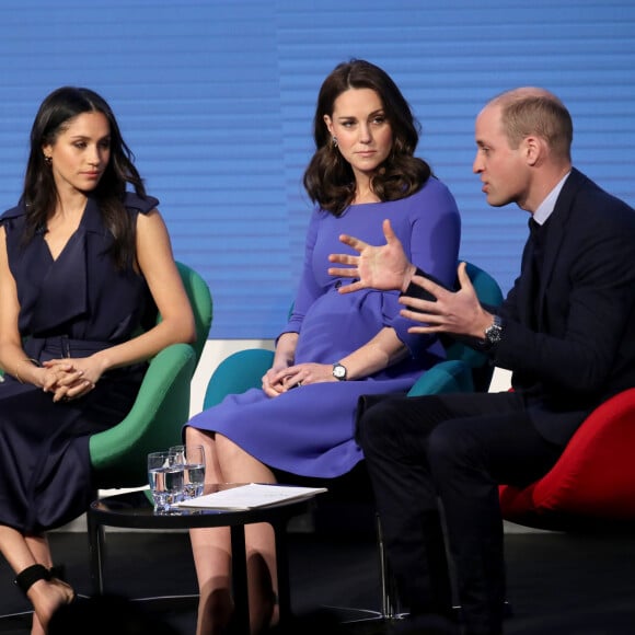 Le prince William, Catherine (Kate) Middleton, le prince Harry et Meghan Markle assistent au premier forum annuel de la Royal Foundation qui se tient à Aviva le 28 février 2018 à Londres, en Angleterre.