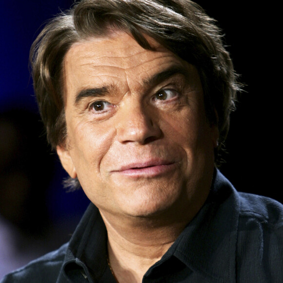 Mais Bernard Tapie n'a pas pour autant abandonné sa femme et ses enfants puisqu'il enverrait des signes
Archives - Portrait de Bernard Tapie. Le 27 juin 2005 © Cédric Perrin / Bestimage