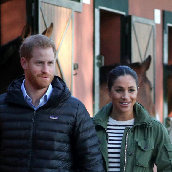 Le prince Harry, duc de Sussex et Meghan Markle (enceinte), duchesse de Sussex en visite à la Fédération Royale Marocaine de Sports Equestres à Rabat, lors de leur voyage officiel au Maroc. Le 25 février 2019.