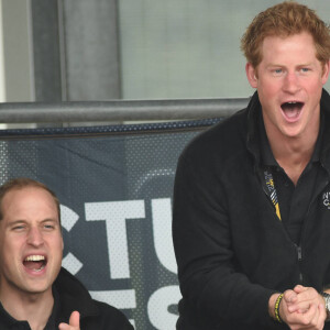 Le prince Charles et ses fils les princes Harry et William assistent aux Invictus Games 2014 (Jour 1) à Londres, le 11 septembre 2014. 