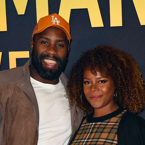 Avec seulement deux places, sa femme ne peut pas venir avec ses deux enfants. 
Teddy Riner et sa femme Luthna Plocus - Première du film "Bob Marley One Love" au Grand Rex à Paris le 1 fevrier 2024. © Coadic Guirec/Bestimage 