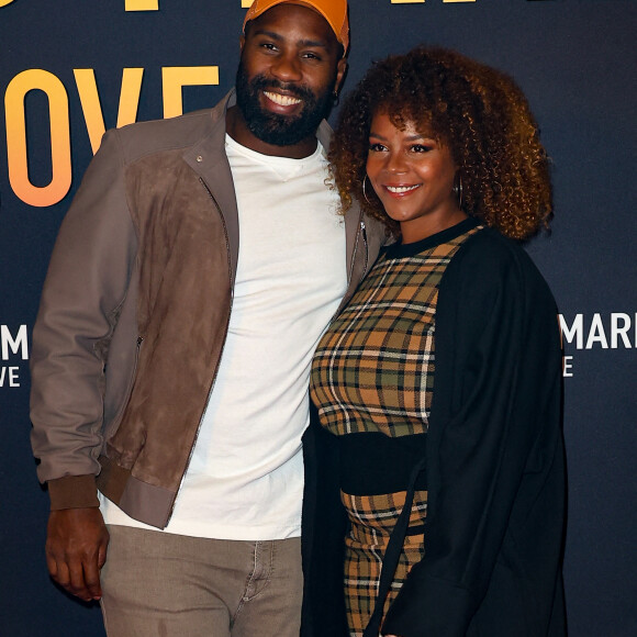 De quoi ravir sa femme ! 
Teddy Riner et sa femme Luthna Plocus - Première du film "Bob Marley One Love" au Grand Rex à Paris le 1 fevrier 2024. © Coadic Guirec/Bestimage 