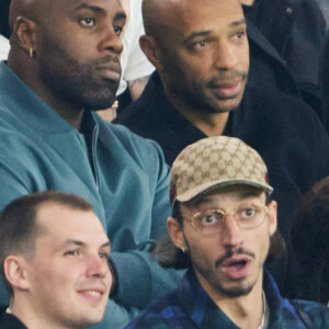 Teddy Riner, Thierry Henry, Romeo Elvis, Tina Kunakey - People dans les tribunes lors du match de football Ligue 1 Uber Eats opposant le PSG à l'OM (4-0) au Parc des Princes à Paris le 24 septembre 2023. © Cyril Moreau/Bestimage 