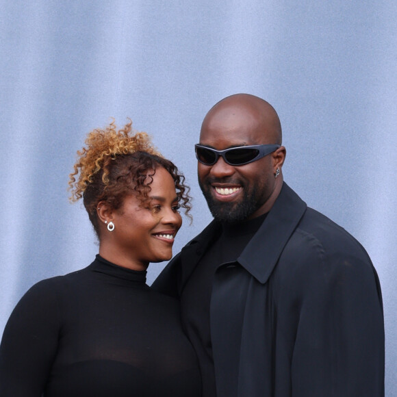 Teddy Riner et sa femme Luthna Plocus - Arrivées au défilé Balenciaga mode femme automne / hiver 2024-2025 à la Sorbonne Nouvelle lors de la Fashion Week de Paris (PFW), à Paris, France, le 3 mars 2024. © Denis Guignebourg/Bestimage 