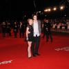 Robert Pattinson et Emilie de Ravin, à l'occasion de l'avant-première anglaise de Remember Me, qui s'est tenue à l'Odeon Cinema de Leicester Square, à Londres, le 17 mars 2010.