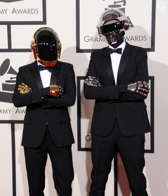 Elle est, effectivement, in love de Thomas Bangalter depuis des lustres et elle a eu, avec lui, deux garçons : Tara-Jay en 2002 et Roxan en 2008.
Daft Punk (Thomas Bangalter et Guy-Manuel de Homem-Christo) - 56e ceremonie des Grammy Awards à Los Angeles le 26 janvier 2014.