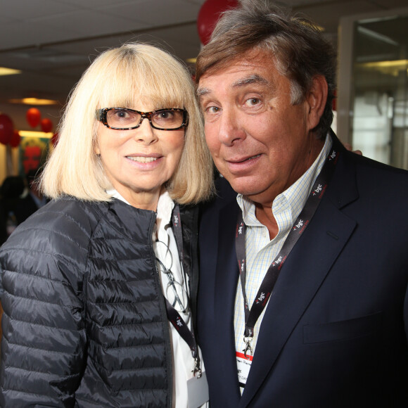 Charity Day BGC 2014 - Jean-Pierre Foucault et Mireille Darc- Courtier d'un jour pour encourager les clients à passer ce jour là le maximum d'ordres dans la salle des marchés d'Aurel BGC Rue Vivienne à Paris. Le 11 septembre 2014