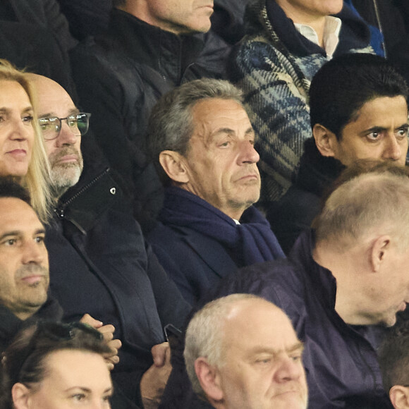 Nicolas Sarkozy, Nasser al-Khelaïfi - Célébrités dans les tribunes du match de Ligue 1 Uber Eats "PSG-Lyon" (4-1) au Parc des Princes à Paris le 21 avril 2024. © Cyril Moreau/Bestimage