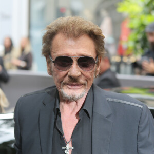 Le combat de Johnny Hallyday contre la maladie a été particulièrement rude. 
Johnny Hallyday - Arrivées au défilé de mode Haute-Couture automne-hiver "Christian Dior" à Paris.  © CVS-Veeren / Bestimage 