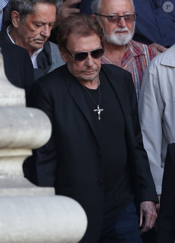 Johnny Hallyday - Sorties des obsèques de Mireille Darc en l'église Saint-Sulpice à Paris. Le 1er septembre 2017 