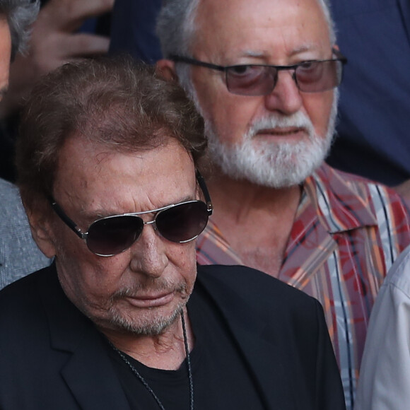 Johnny Hallyday - Sorties des obsèques de Mireille Darc en l'église Saint-Sulpice à Paris. Le 1er septembre 2017 