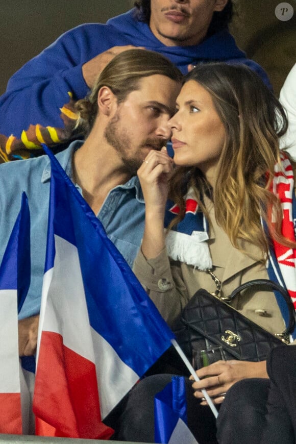 Camille Cerf (Miss France 2015) et son compagnon Théo Fleury - People dans les tribunes lors du match de la 5ème et avant-dernière journée de Ligue des nations entre la France et l'Autriche (2-0) au Stade de France à Saint-Denis le 22 septembre 2022.