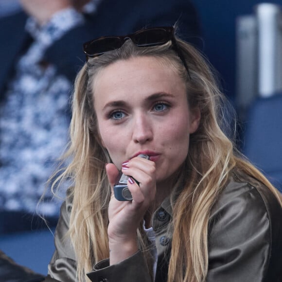 Chloé Jouannet et Yvan Naubron - Célébrités dans les tribunes du match de Ligue 1 Uber Eats "PSG-Toulouse" (1-3) au Parc des Princes à Paris le 12 mai 2024. © Cyril Moreau/Bestimage