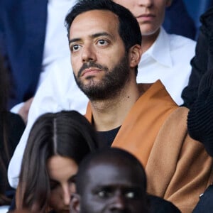 Tarek Boudali - Célébrités dans les tribunes du match de Ligue 1 Uber Eats "PSG-Toulouse" (1-3) au Parc des Princes à Paris le 12 mai 2024. © Cyril Moreau/Bestimage