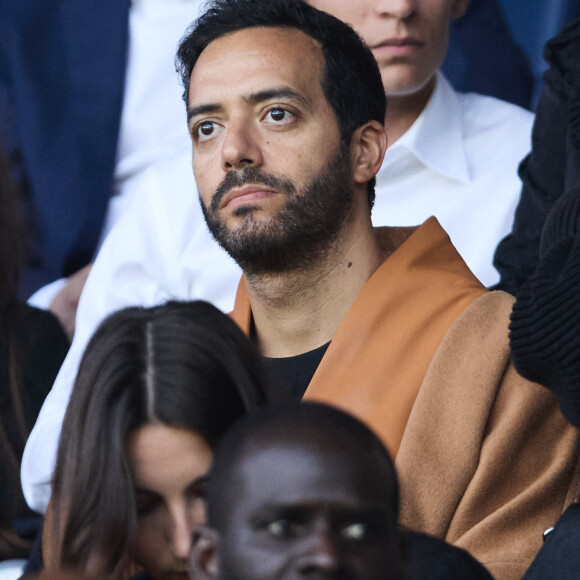 Tarek Boudali - Célébrités dans les tribunes du match de Ligue 1 Uber Eats "PSG-Toulouse" (1-3) au Parc des Princes à Paris le 12 mai 2024. © Cyril Moreau/Bestimage