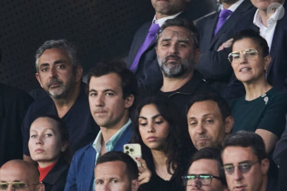 Éric Toledano et Olivier Nakache - Célébrités dans les tribunes du match de Ligue 1 Uber Eats "PSG-Toulouse" (1-3) au Parc des Princes à Paris le 12 mai 2024. © Cyril Moreau/Bestimage