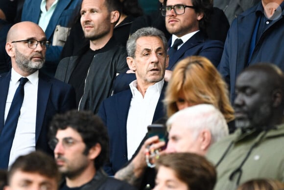 Nicolas Sarkozy - Célébrités dans les tribunes du match de Ligue 1 Uber Eats "PSG-Toulouse" (1-3) au Parc des Princes à Paris le 12 mai 2024.