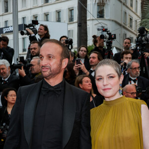 Michel Ferracci et sa femme Emilie Dequenne - Montée des marches du film " Le deuxième acte " pour la cérémonie d'ouverture du 77ème Festival International du Film de Cannes, au Palais des Festivals à Cannes. Le 14 mai 2024 © Jacovides-Moreau / Bestimage 