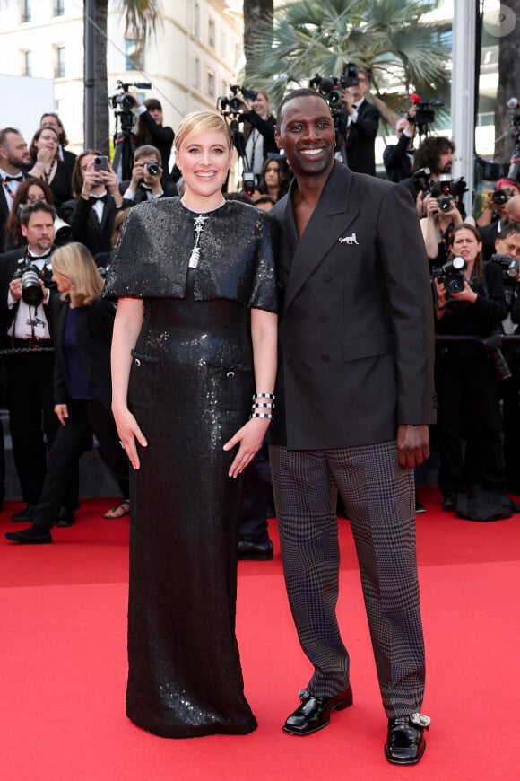 Greta Gerwig, Omar Sy - Montée des marches du film " Megalopolis " lors du 77ème Festival International du Film de Cannes, au Palais des Festivals à Cannes. Le 16 mai 2024 © Jacovides-Moreau / Bestimage 