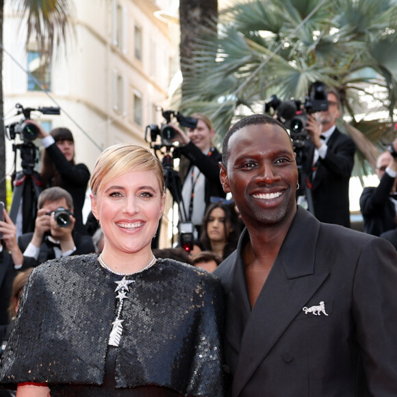 Greta Gerwig, Omar Sy - Montée des marches du film " Megalopolis " lors du 77ème Festival International du Film de Cannes, au Palais des Festivals à Cannes. Le 16 mai 2024 © Jacovides-Moreau / Bestimage 