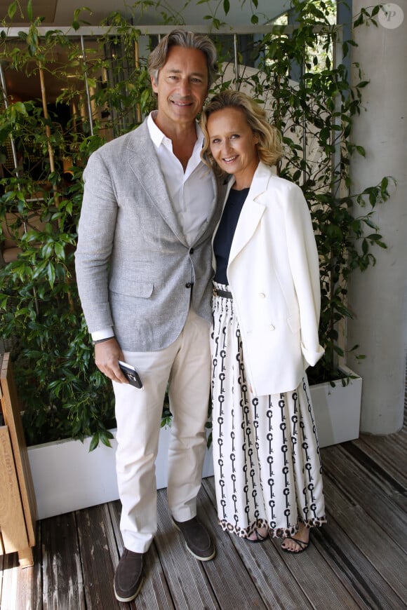 Laurent Solly (Président de Facebook France) et sa femme Caroline Roux aux Internationaux de France de Tennis de Roland Garros 2023 - Jour 06 - à Paris, France, le 2 juin 2023. © Bertrand Rindoff/Bestimage 