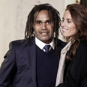 L'ancien footballeur français Christian Karembeu et sa femme Jacky Chamoun - Dîner au Palais de l'Elysée en l'honneur des 50 ans du Variétés Club de France, à Paris, le 14 octobre 2021. © Stéphane Lemouton / Bestimage